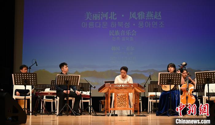 圖為音樂會現(xiàn)場?！∈谞栔袊幕行墓﹫D